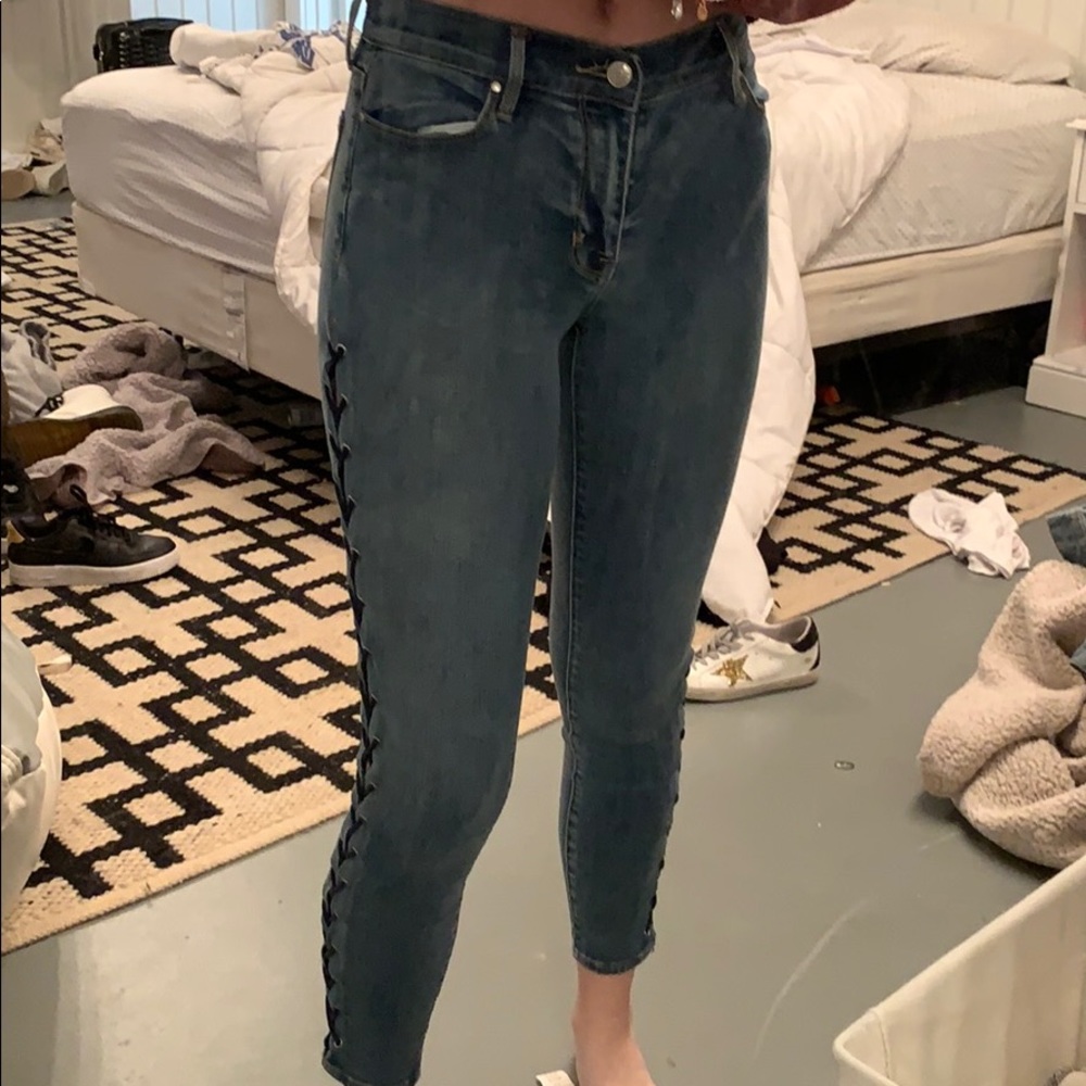 Cross cross skinny jeans